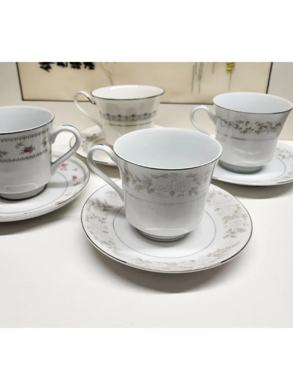 Mismatched China Tea Cups & Saucers Soft Floral Designs 4 Sets